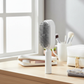 Self-Cleaning Hair Brush with Retractable Bristles